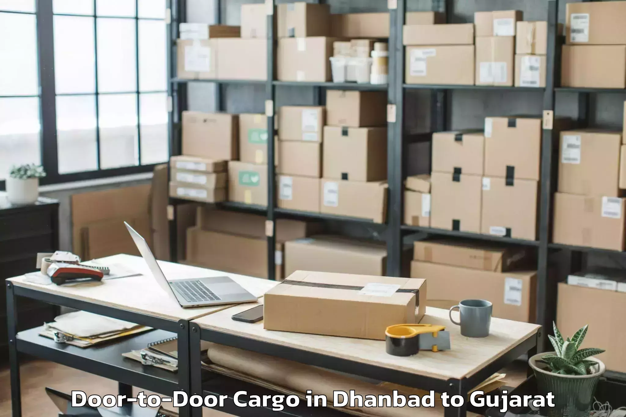 Hassle-Free Dhanbad to Adalaj Door To Door Cargo